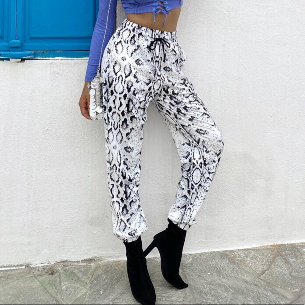 SNAKE PRINT JOGGERS